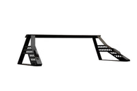 A truck bed chase rack that works as a truck bed bike rack, truck bed dirt bike rack, truck bed ski and snowboard rack