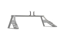 A ladder rack for truck beds using the Big Days Chase Rack System to haul long items like lumber and pipes in pickup trucks without damaging the roof